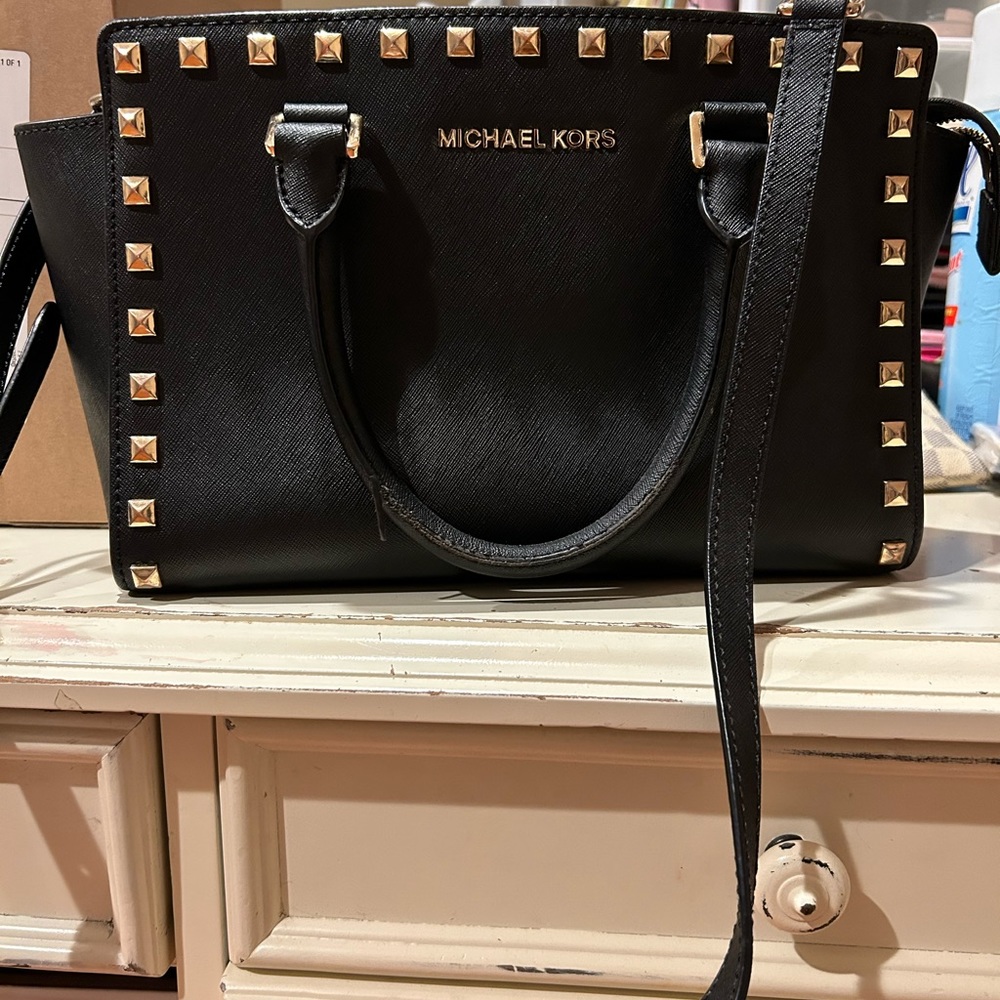Michael Kors black purse crossbody with gold decor!